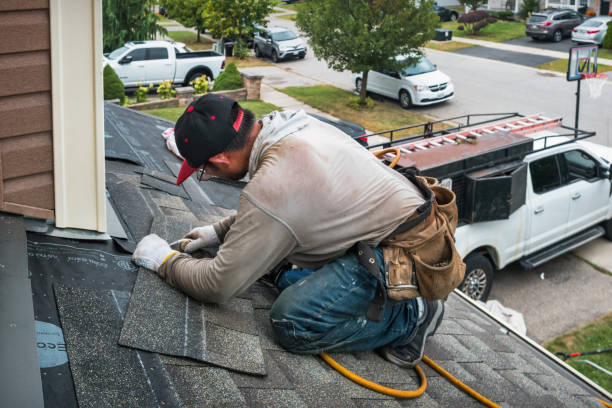 Professional Roofing technician working in Brooktondale, NY